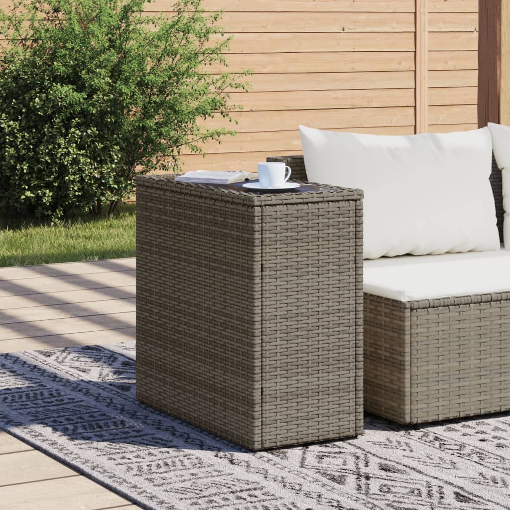 vidaXL Zahradní stolek se skleněnou deskou šedý 58x27,5x55cm polyratan