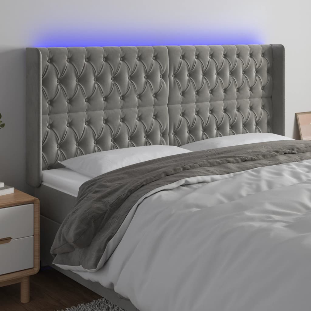 vidaXL Čelo postele s LED světle šedé 183 x 16 x 118/128 cm samet
