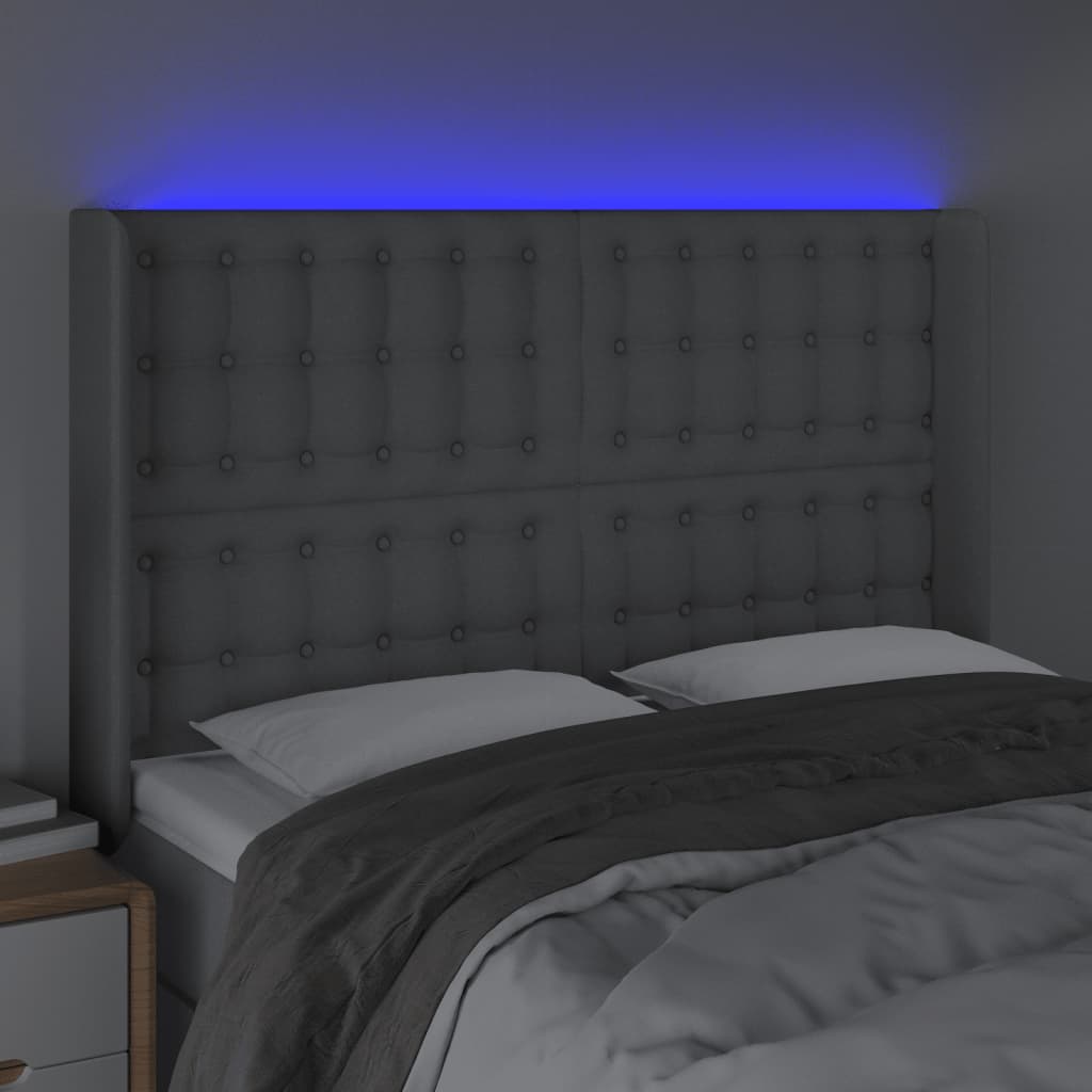 vidaXL Čelo postele s LED světle šedé 147x16x118/128 cm textil
