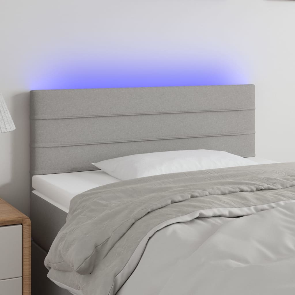 vidaXL Čelo postele s LED světle šedé 90x5x78/88 cm textil